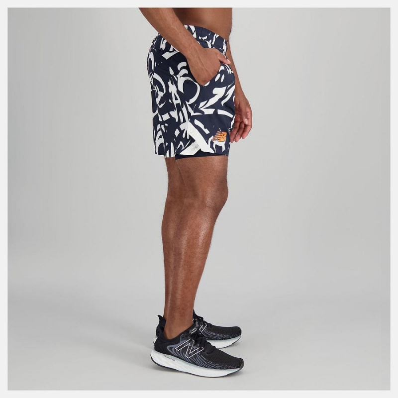 Short New Balance Printed Tournament 7 In Hombre Negras Blancas | EC 1445KI